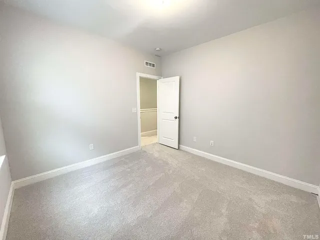 an empty room with an entryway