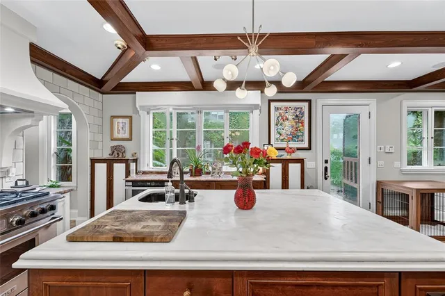 a view of a dining room with furniture window and outside view