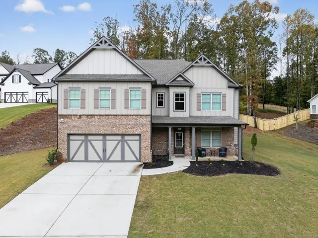 a view of house with garden