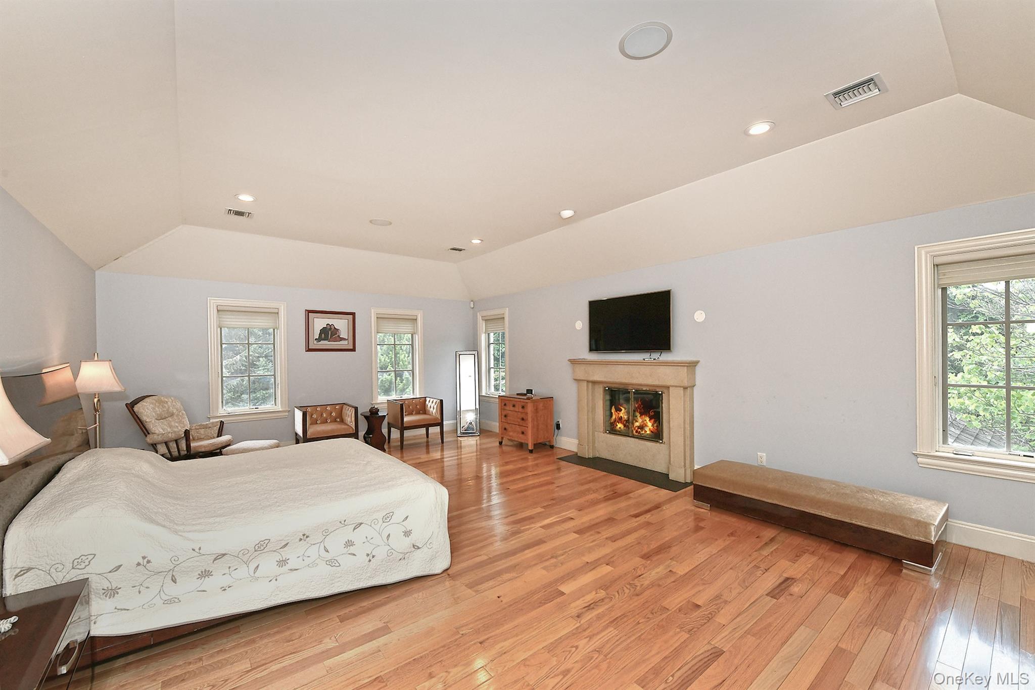 14 Norgate Road Glen Head, NY 11545 - Photo 20 of 44 a bedroom with a bed and a flat screen tv