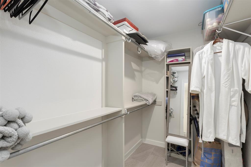 5100 Verde Valley Lane, Unit 135 Dallas, TX 75254 - Photo 17 of 26 Large walk-in primary closet.