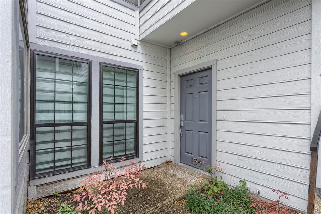 5100 Verde Valley Lane, Unit 135 Dallas, TX 75254 - Photo 19 of 26 Front door of the condo