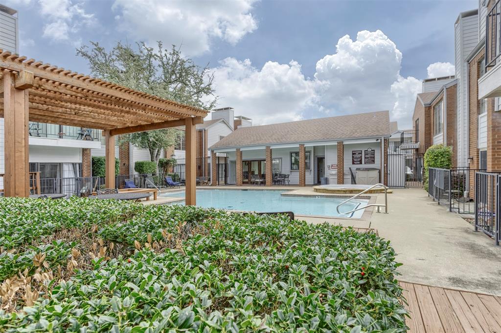 5100 Verde Valley Lane, Unit 135 Dallas, TX 75254 - Photo 24 of 26 The community pool is close to the unit.