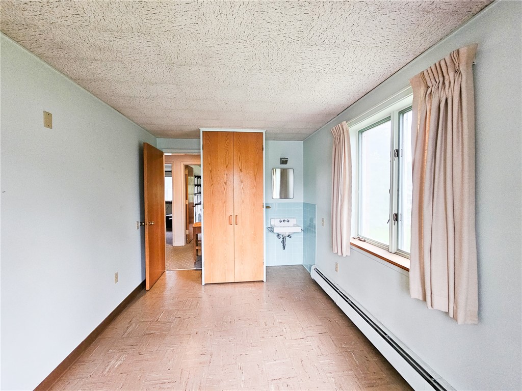 10 South Lewis Street Auburn, NY 13021 - Photo 18 of 29 Upstairs bedroom - 13 look alike bedrooms