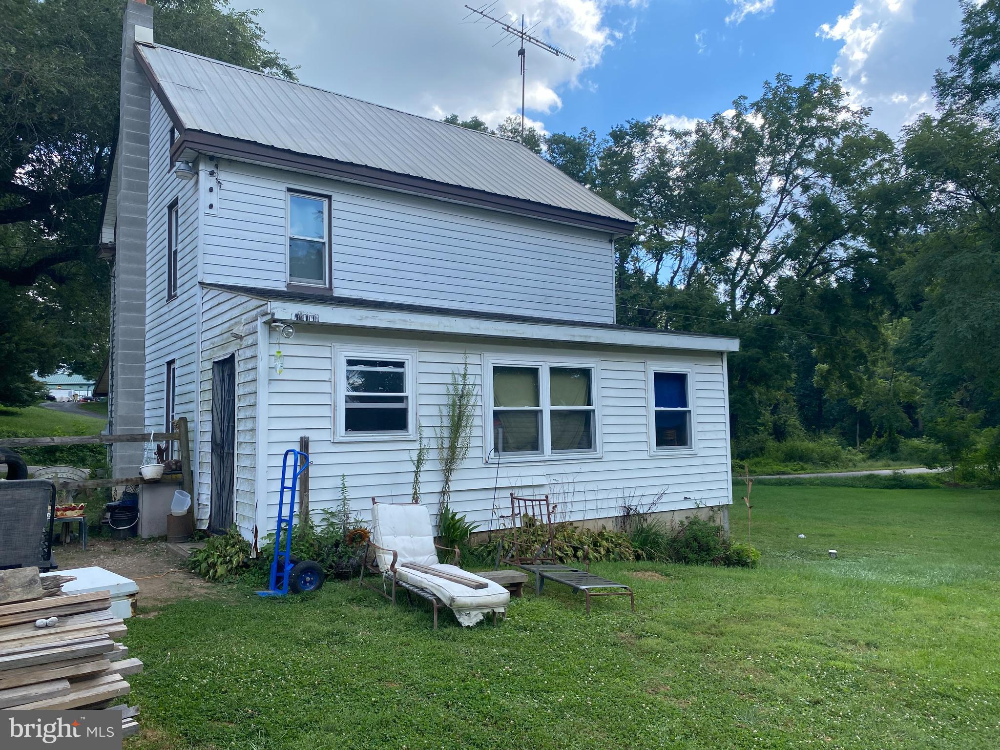 10400 Enfield Road Felton, PA 17322 - Photo 16 of 36 a front view of a house with a yard