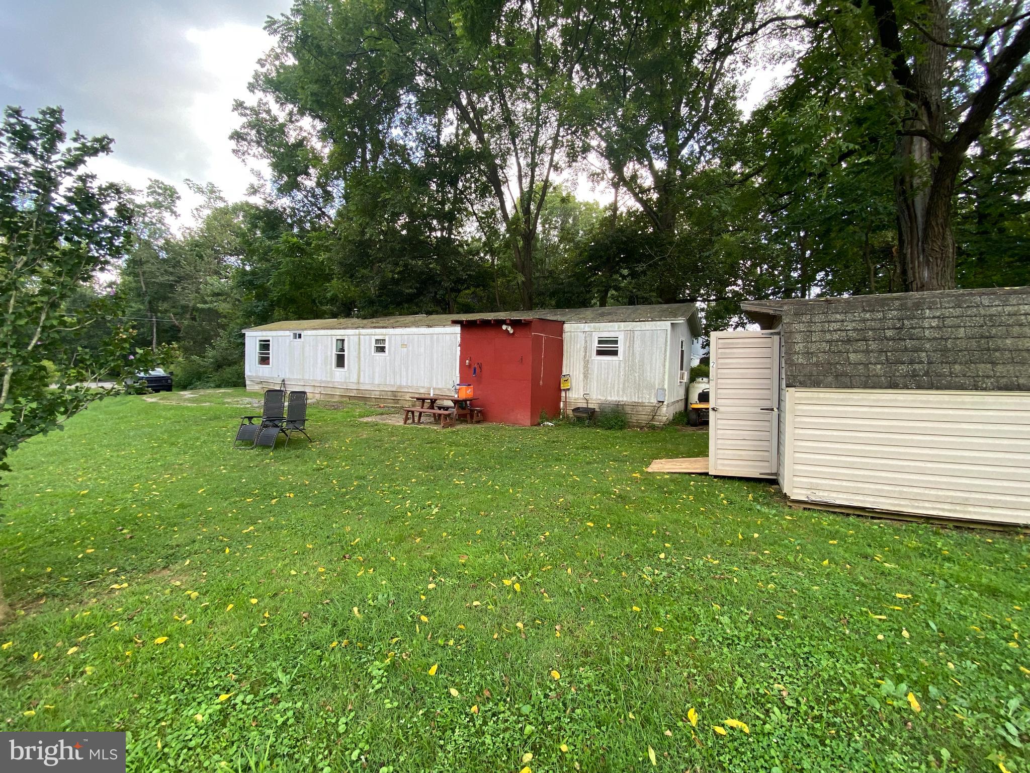 10400 Enfield Road Felton, PA 17322 - Photo 17 of 36 a backyard of a house with lots of green space
