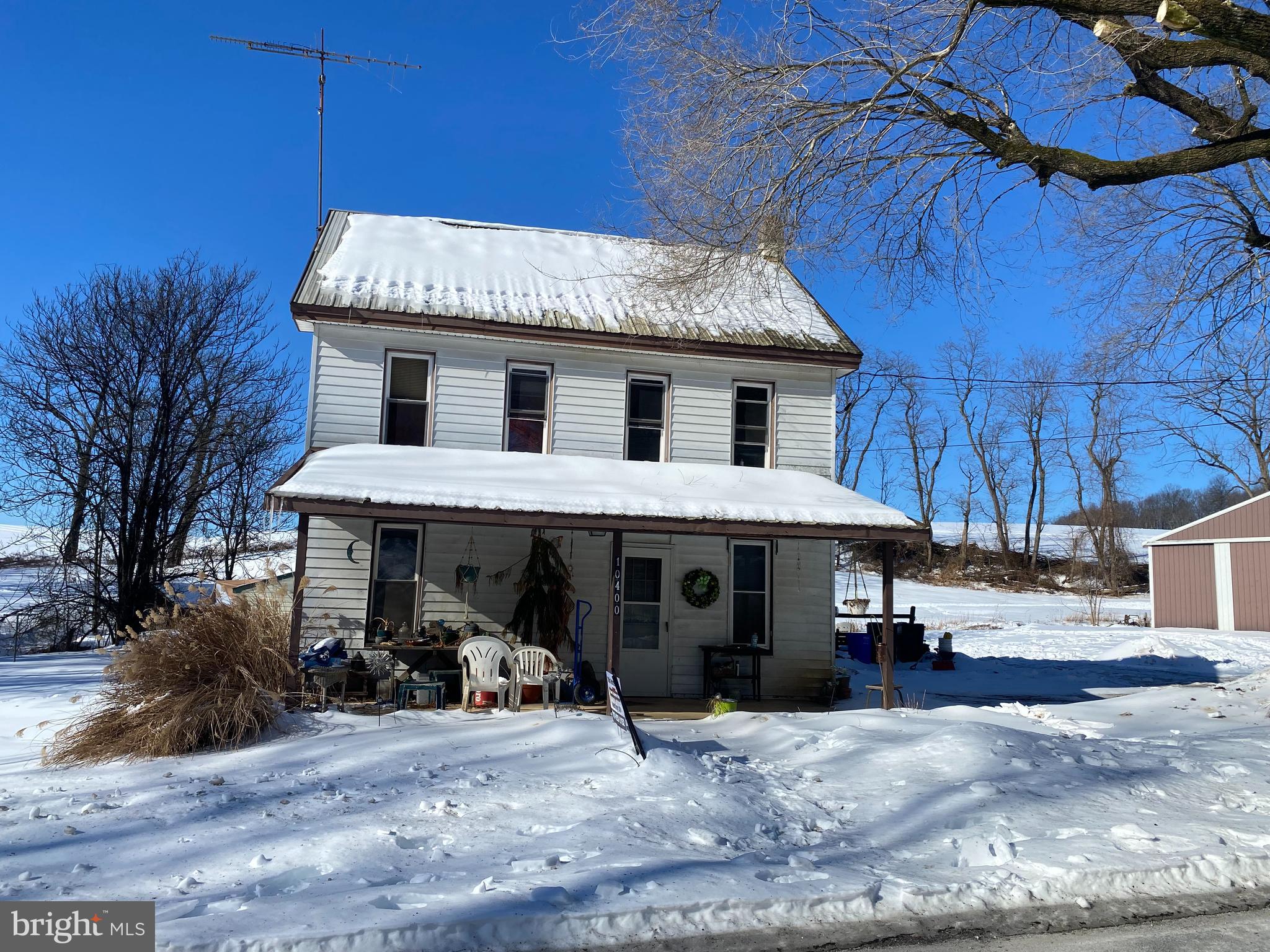 10400 Enfield Road Felton, PA 17322 - Photo 2 of 36 a view of a house with a patio