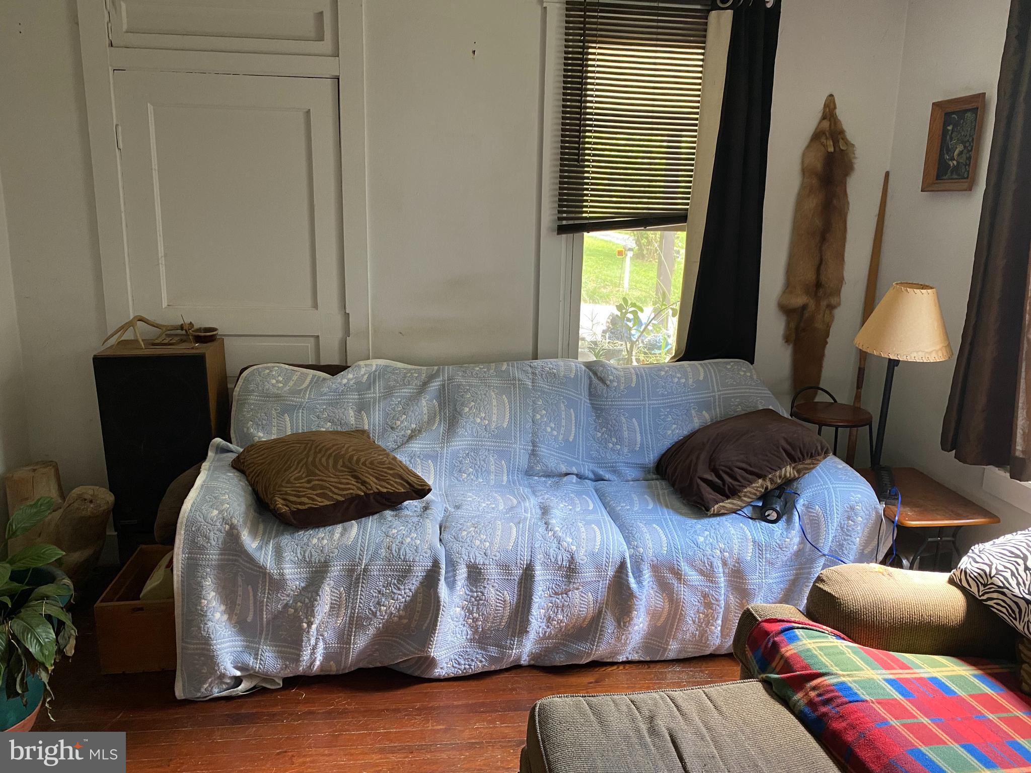 10400 Enfield Road Felton, PA 17322 - Photo 27 of 36 a living room with furniture and a window