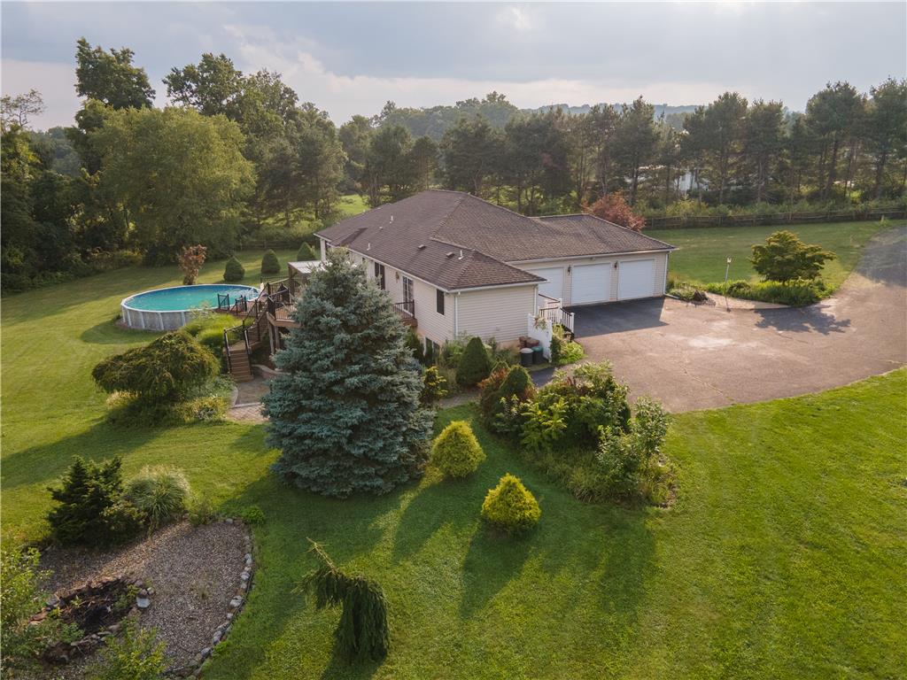 2202 High Meadow Road Coopersburg, PA 18036 - Photo 3 of 41 An aerial perspective showcases the spacious estate with an above ground pool and extensive driveway.
