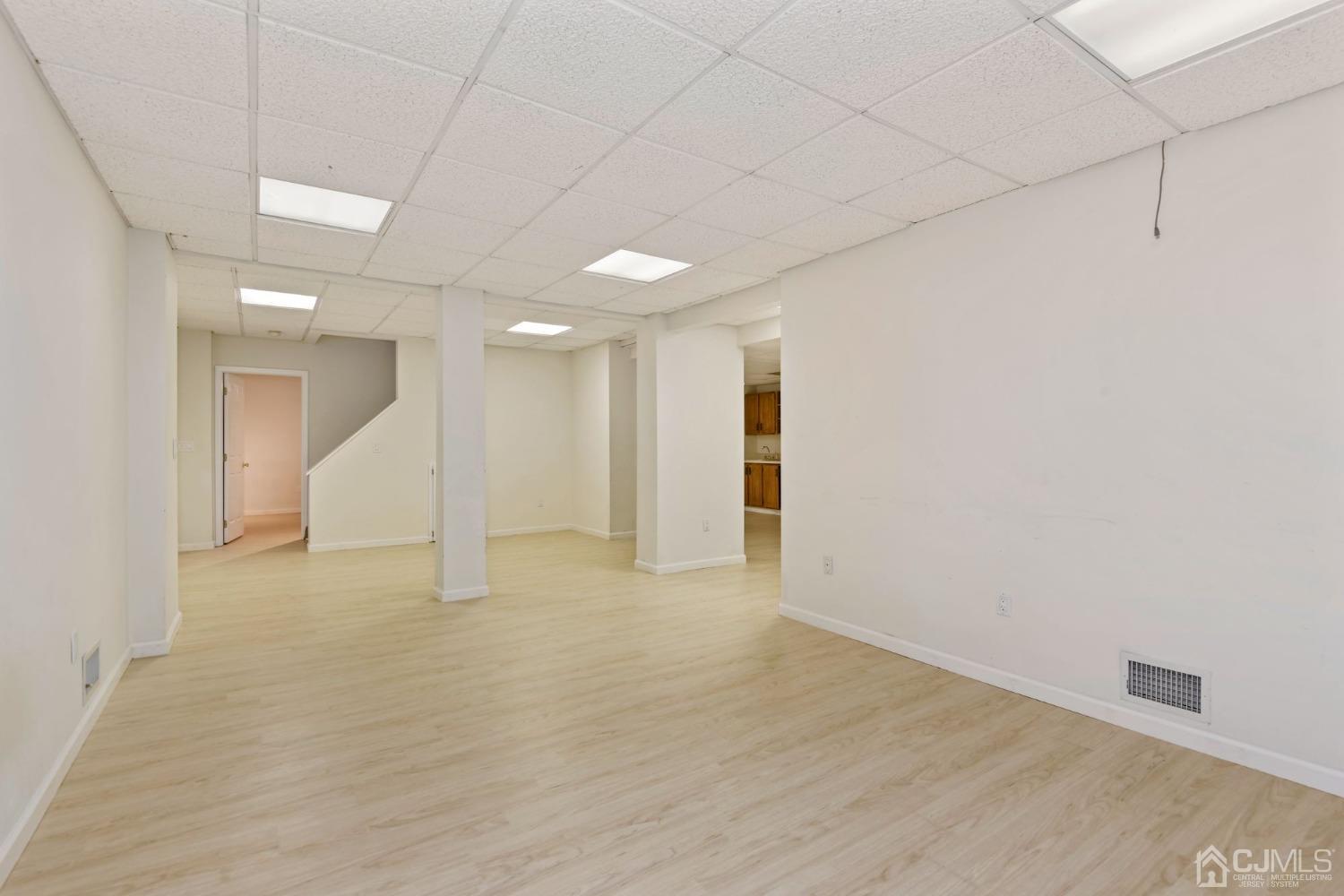 16 Allison Court Edison, NJ 08820 - Photo 25 of 33 a view of an empty room with wooden floor