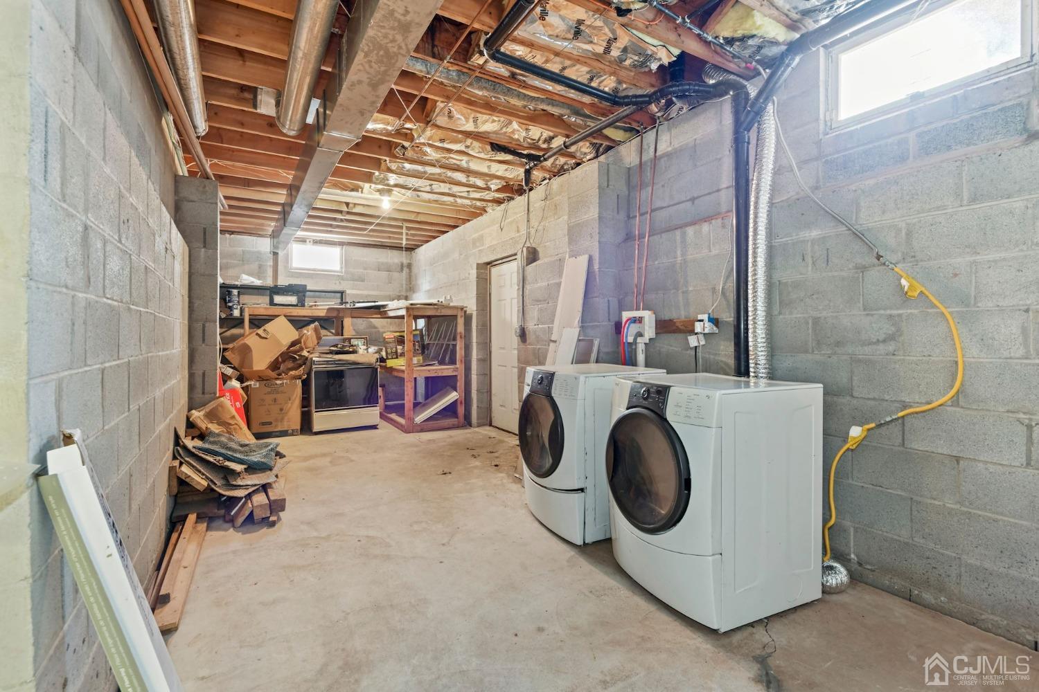 16 Allison Court Edison, NJ 08820 - Photo 29 of 33 a utility room with dryer and washer