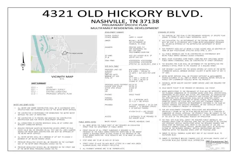 a black and white photo of a living room