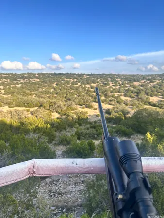 a view of back yard with mountain view
