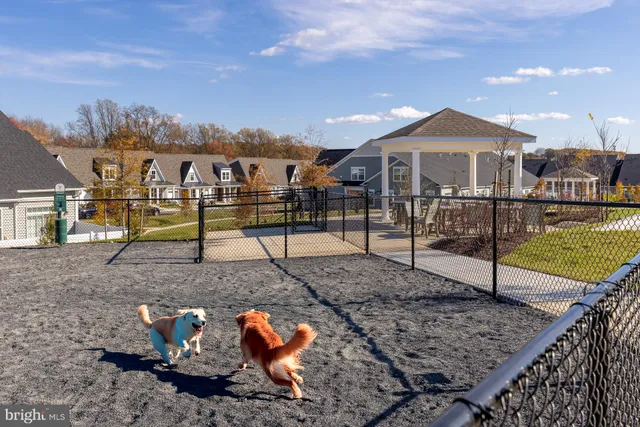 a view of swimming pool with an outdoor seating