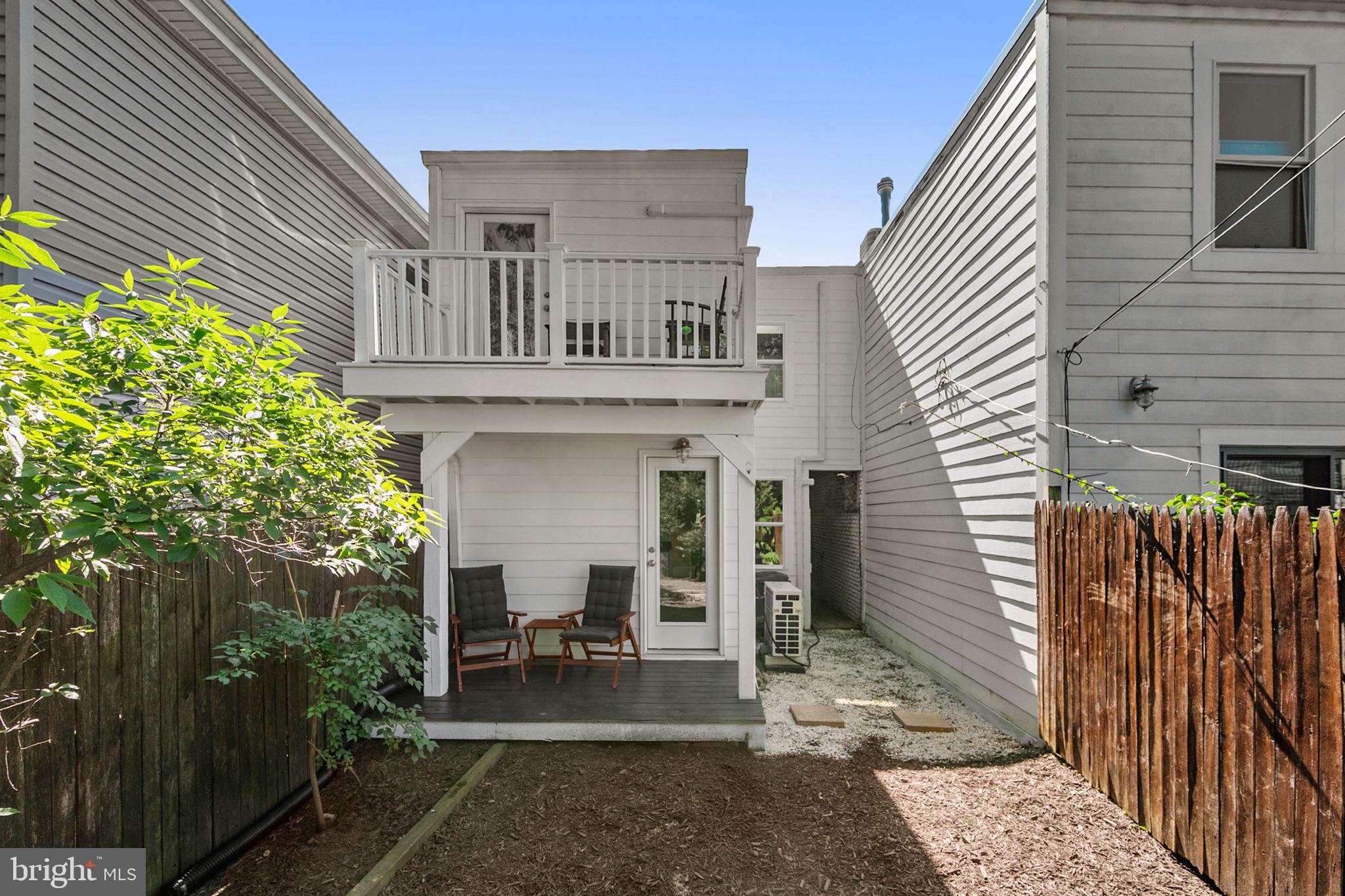 914 15th Street Southeast Washington, DC 20003 - Photo 32 of 37 a view of a house with backyard and sitting area