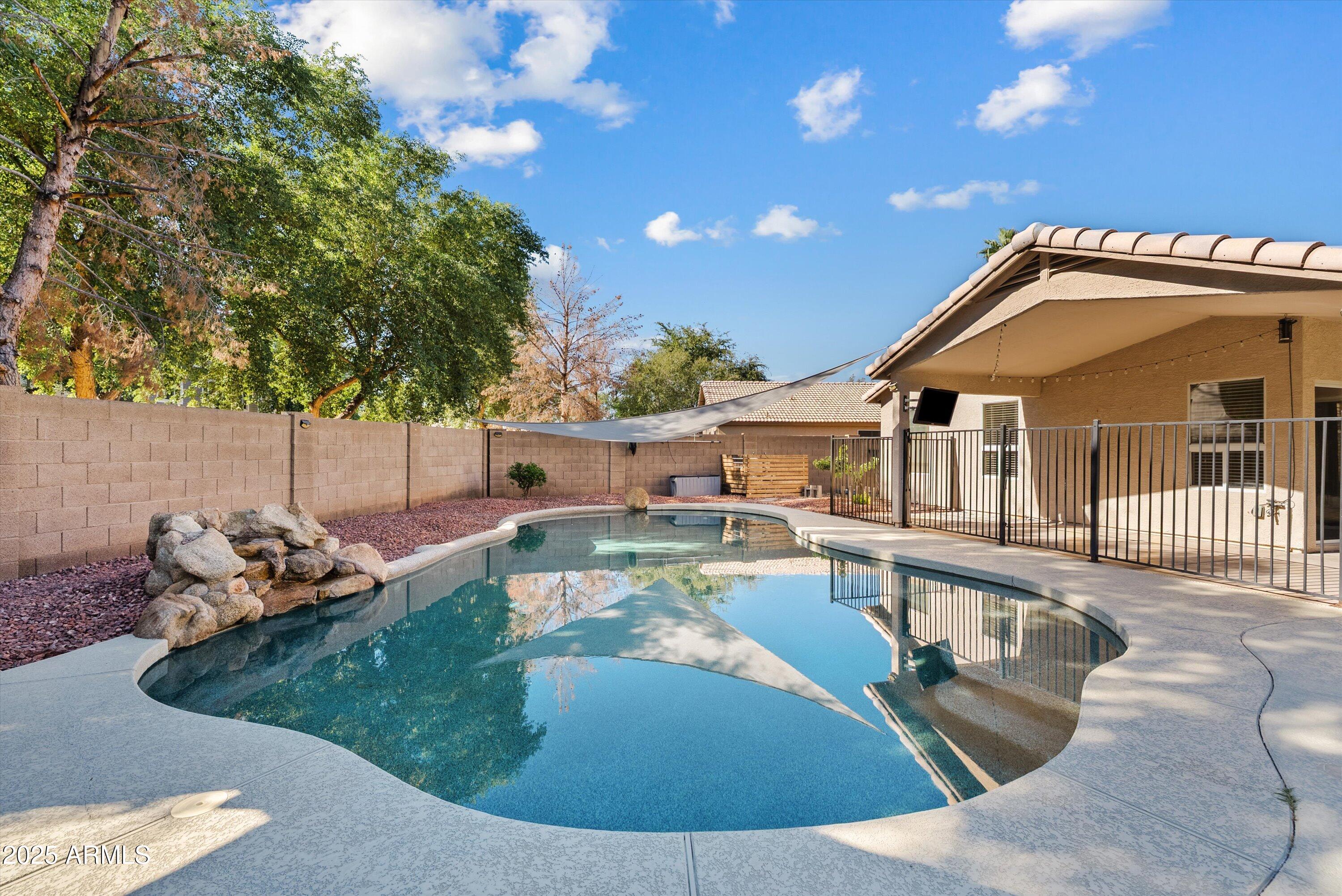 545 South Ash Street Gilbert, AZ 85233 - Photo 28 of 38 a view of a house with backyard