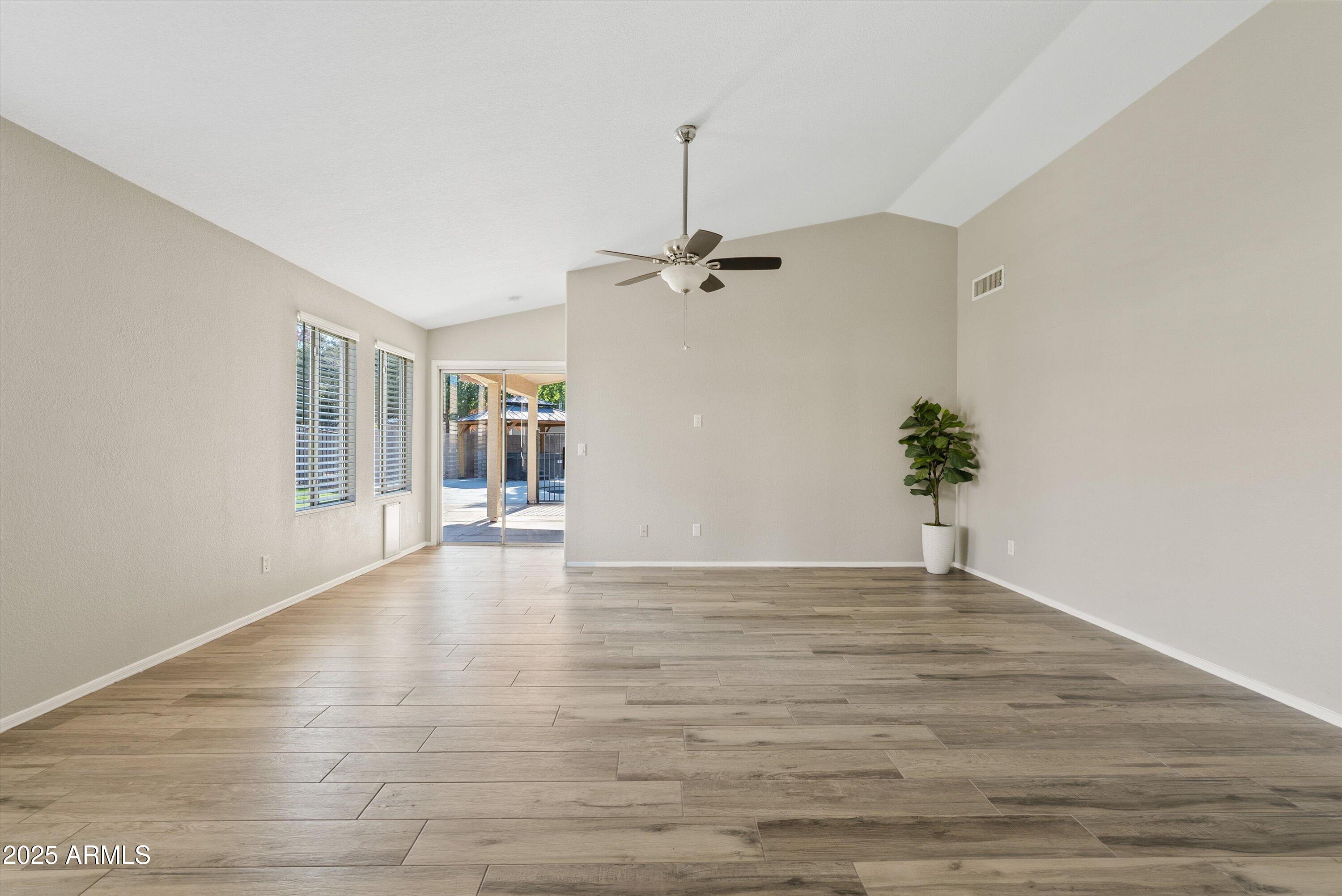 545 South Ash Street Gilbert, AZ 85233 - Photo 5 of 38 a view of an empty room with a window