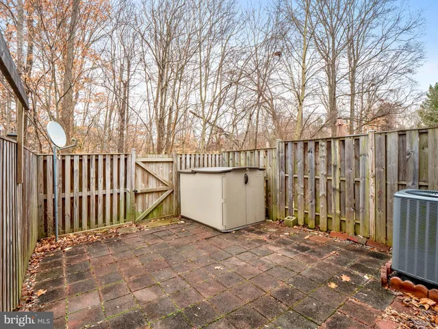 a view of a wooden fence