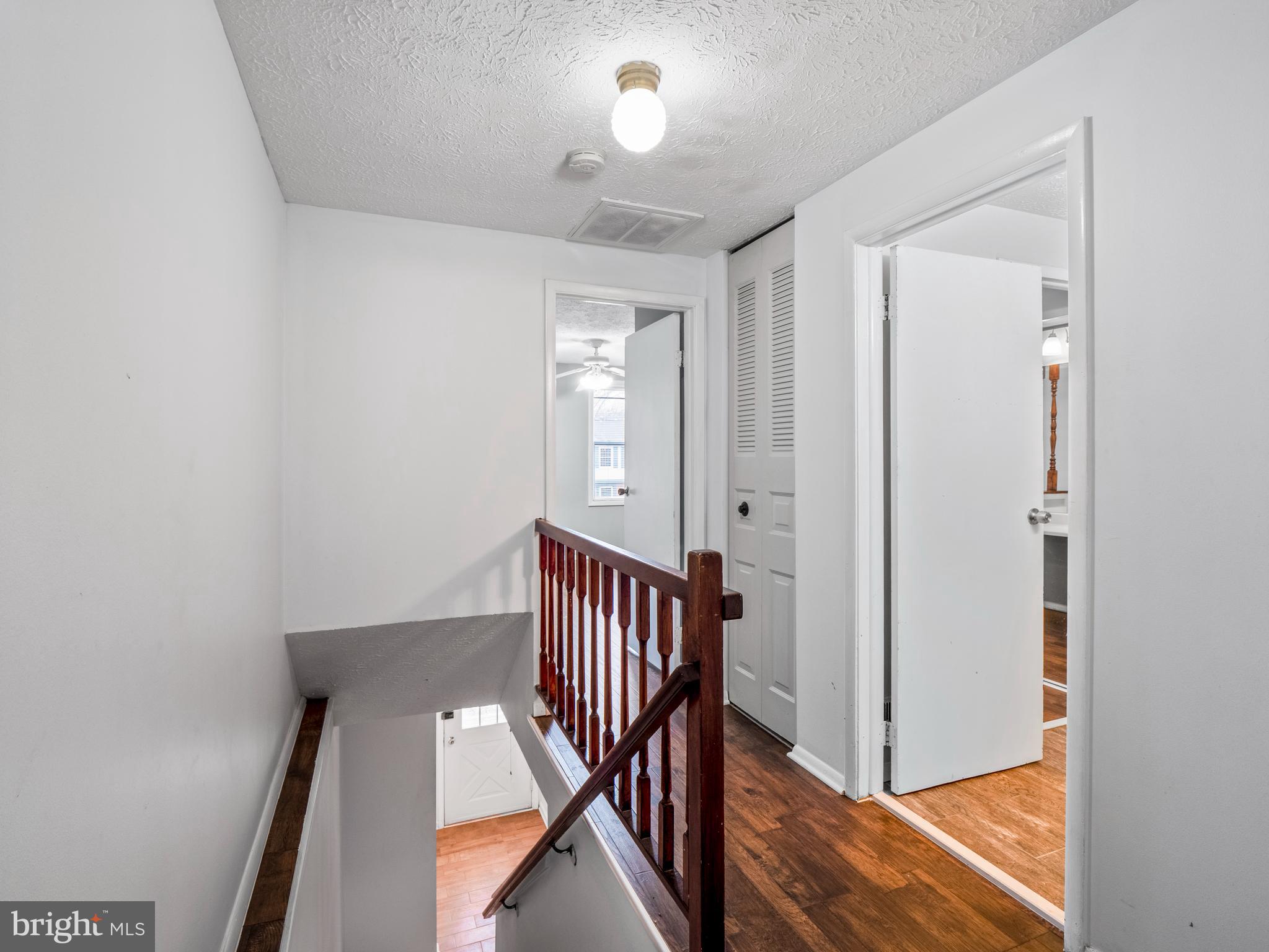 8315 Brookvale Court Springfield, VA 22153 - Photo 19 of 24 a view of hallway with stairs