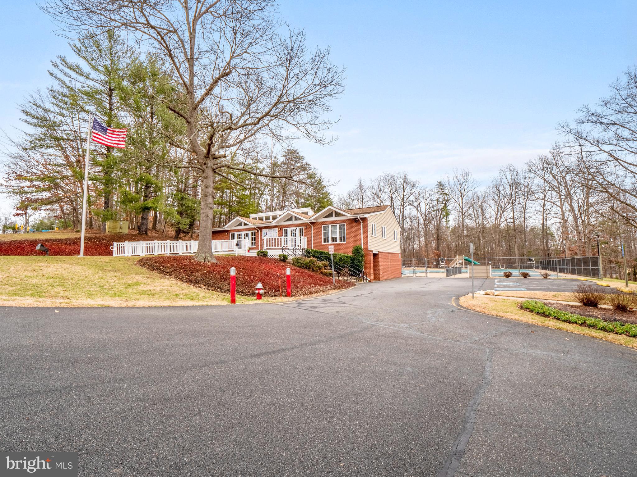 8315 Brookvale Court Springfield, VA 22153 - Photo 23 of 24 a view of a swimming pool with an outdoor space and seating area