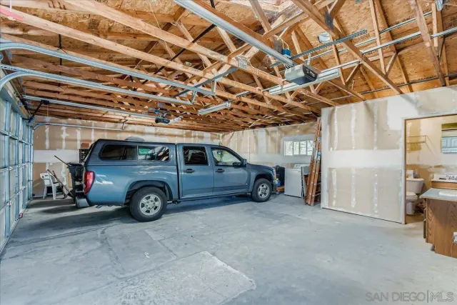 a view of a room with wooden walls