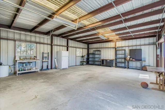 a view of a yard with an ocean view