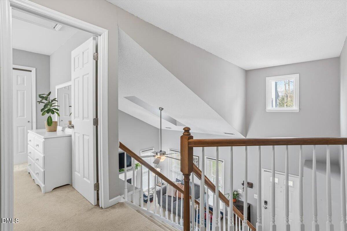 211 Kronos Lane Cary, NC 27513 - Photo 25 of 34 a view of an entryway with wooden floor