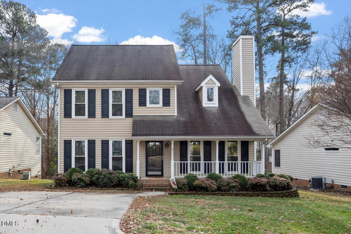 211 Kronos Lane Cary, NC 27513 - Photo 2 of 34 a front view of a house