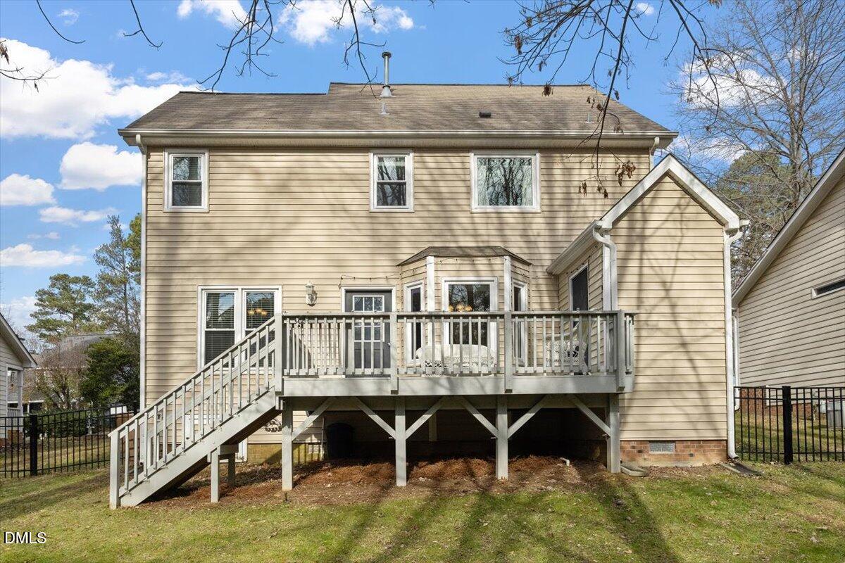 211 Kronos Lane Cary, NC 27513 - Photo 5 of 34 a view of a house with a deck