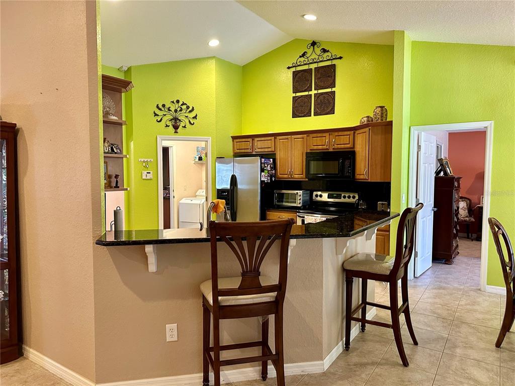 2576 Southwest 175 Loop Ocala, FL 34473 - Photo 18 of 62 a view of kitchen with breakfast area