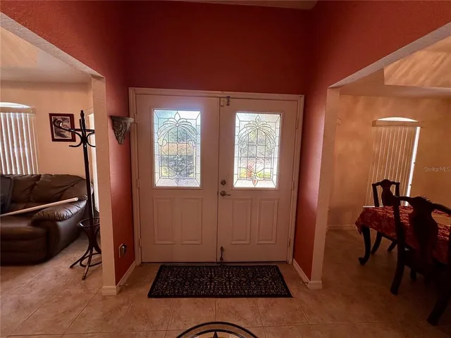 a room with furniture and a window