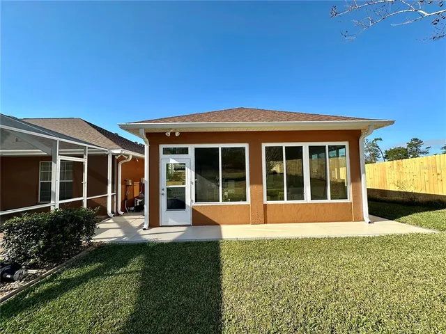 a view of a swimming pool with an ocean beach