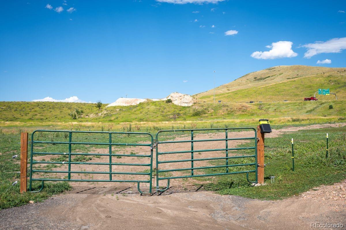 670 South Rooney Road Morrison, CO 80465 - Photo 23 of 35 a view of a balcony with an ocean view