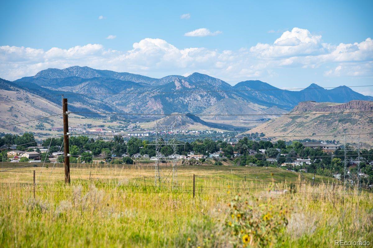670 South Rooney Road Morrison, CO 80465 - Photo 26 of 35 a view of an swimming pool and a yard