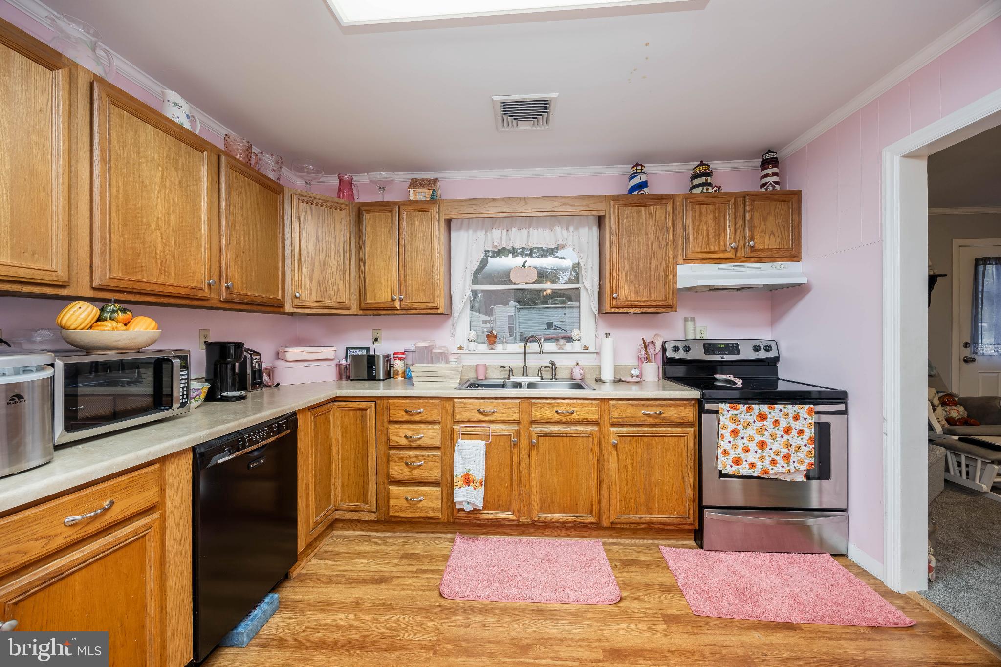 136 Marvel Road Salisbury, MD 21801 - Photo 9 of 42 Charming kitchen with warm wooden accents.