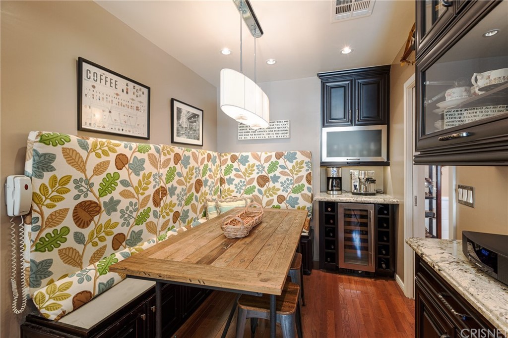 1055 La Loma Road Pasadena, CA 91105 - Photo 14 of 29 a bathroom with a granite countertop tub a sink and a large mirror