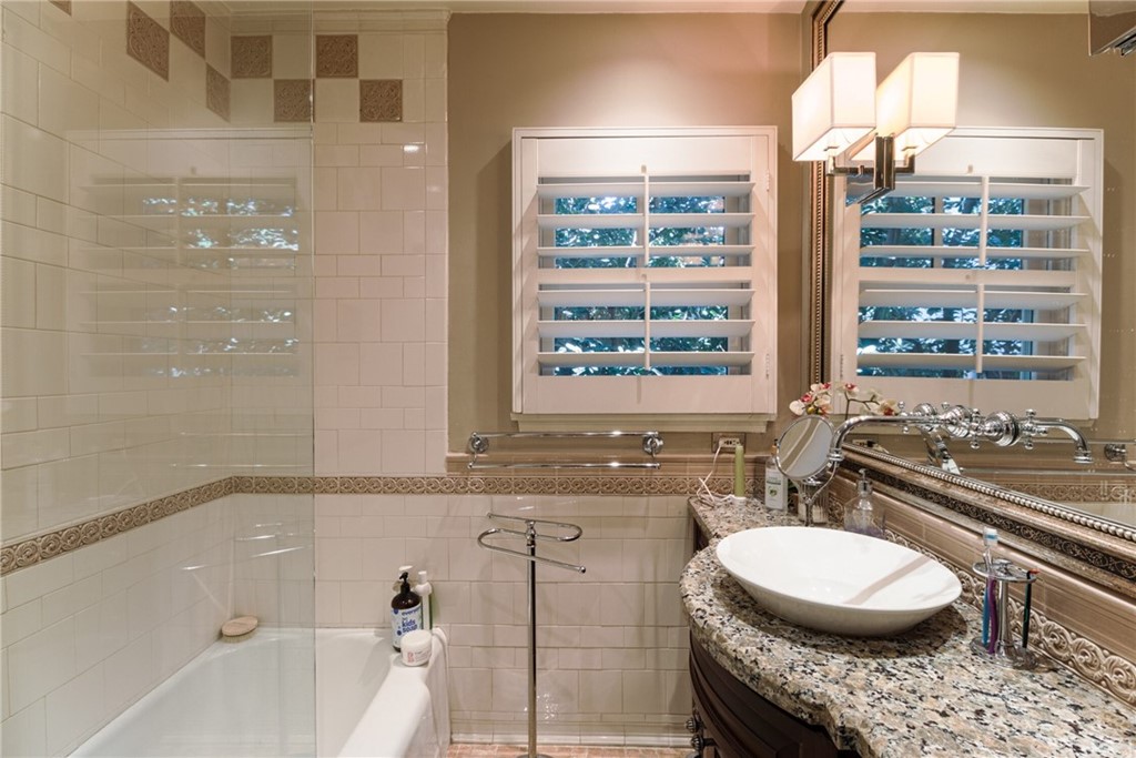 1055 La Loma Road Pasadena, CA 91105 - Photo 16 of 29 a bedroom with two beds and a flat screen tv