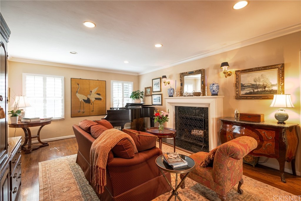 1055 La Loma Road Pasadena, CA 91105 - Photo 5 of 29 a living room with furniture a large window and a flat screen tv