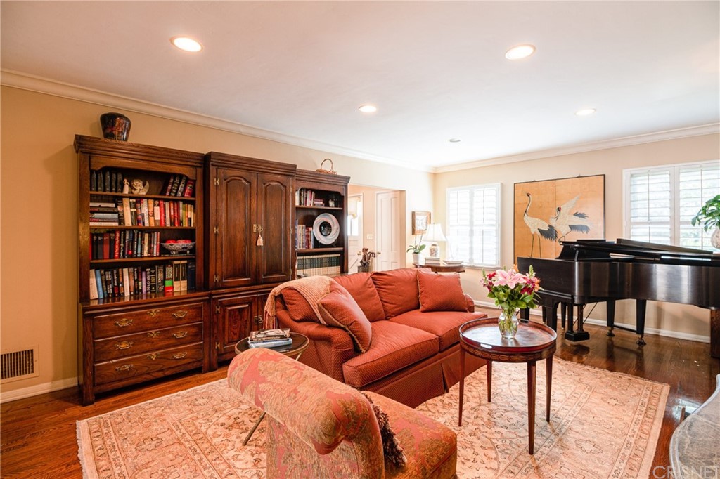1055 La Loma Road Pasadena, CA 91105 - Photo 6 of 29 a living room with furniture a large window and wooden floor