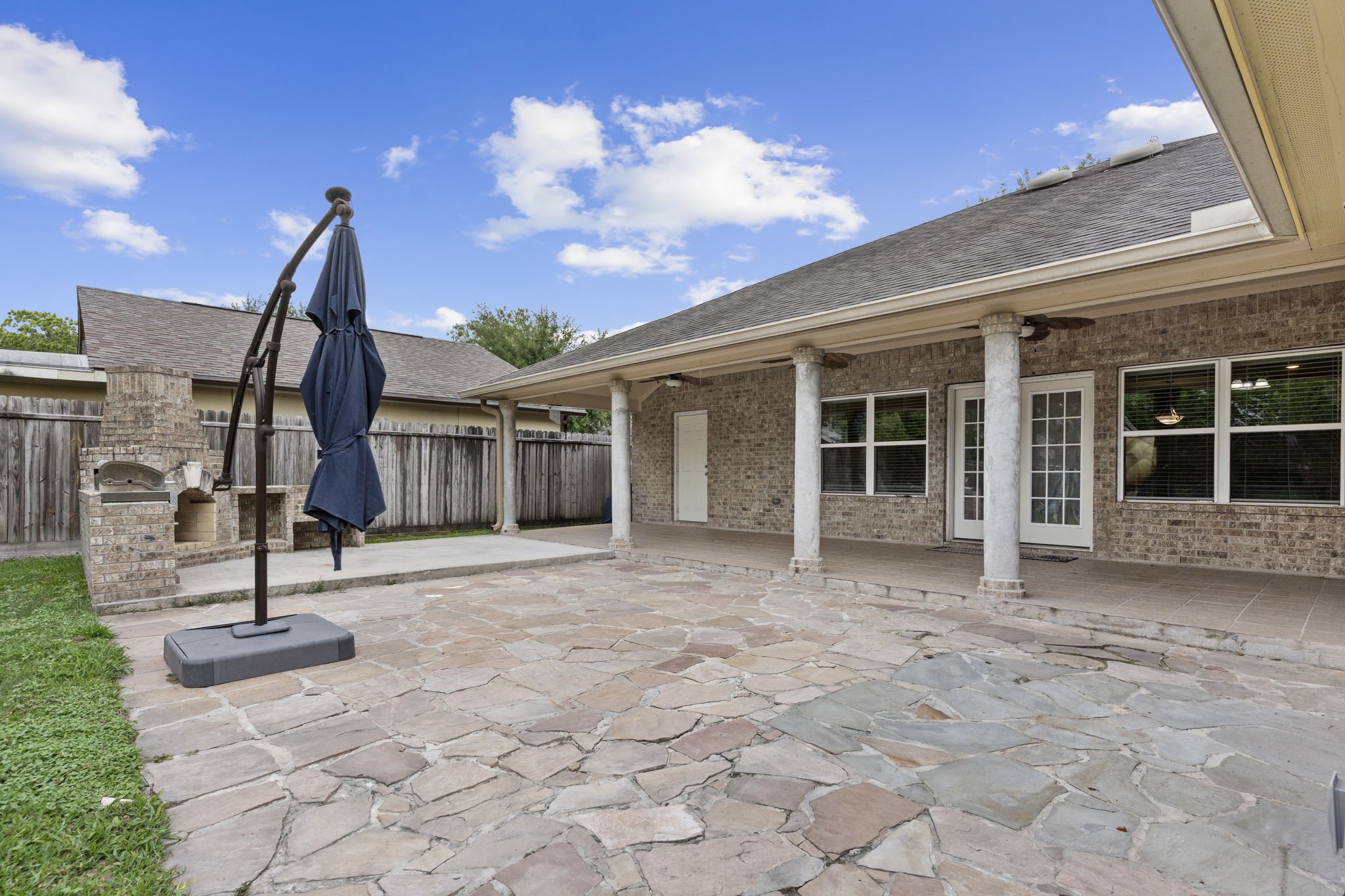631 Apache Street Houston, TX 77022 - Photo 11 of 45 a view of a house with backyard and a patio