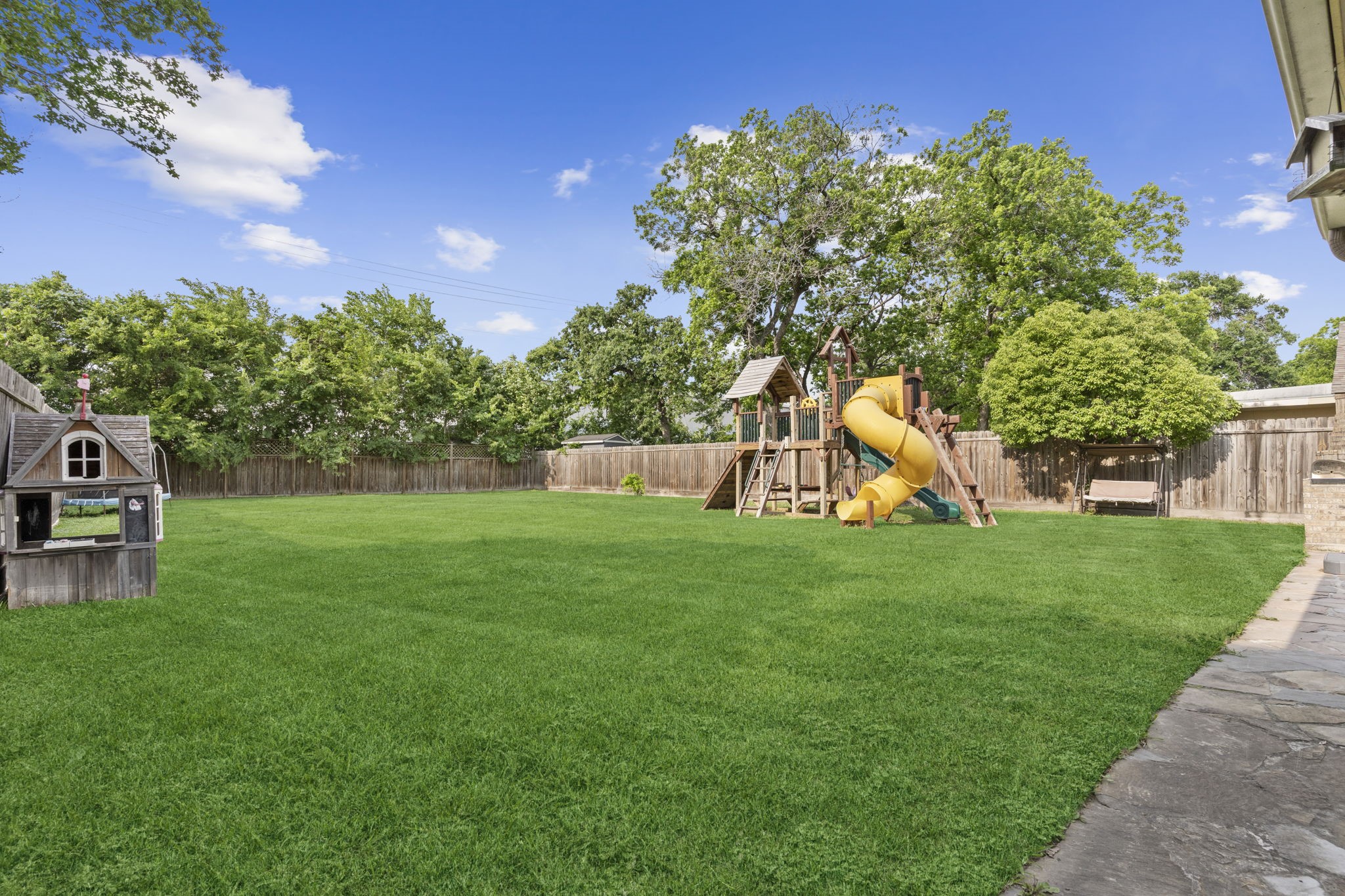 631 Apache Street Houston, TX 77022 - Photo 14 of 45 a view of a backyard with a garden