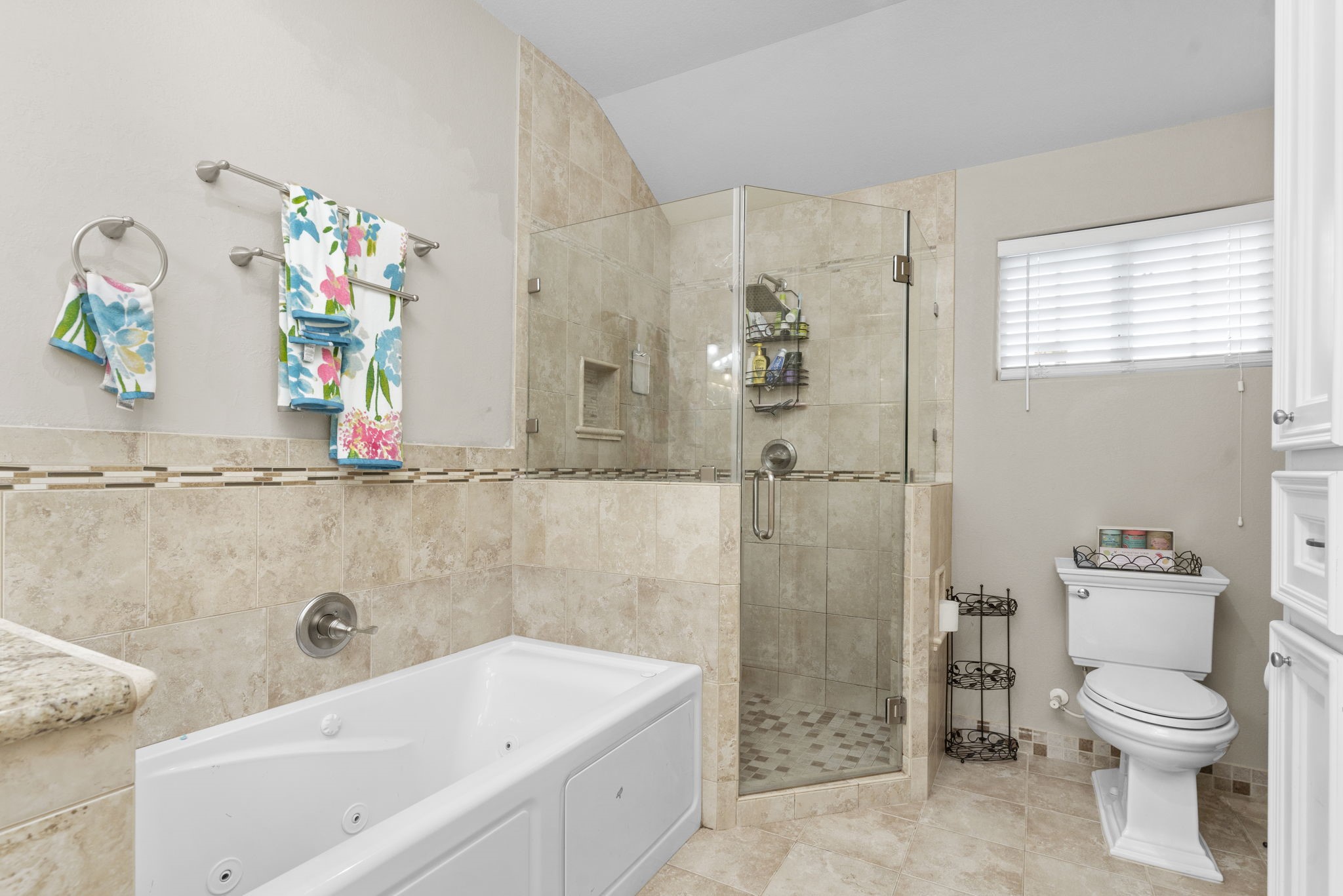 631 Apache Street Houston, TX 77022 - Photo 35 of 45 a bathroom with a sink a toilet and shower