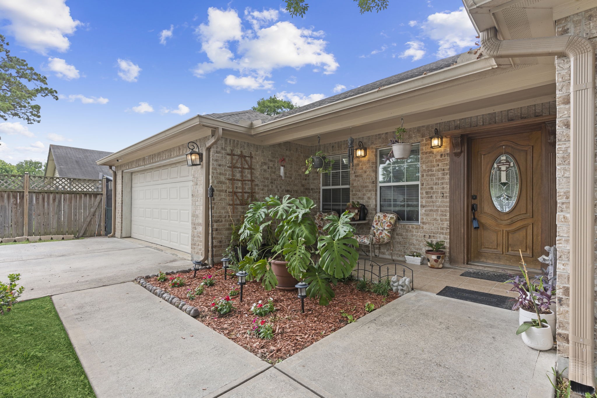 631 Apache Street Houston, TX 77022 - Photo 6 of 45 a front view of a house with garden