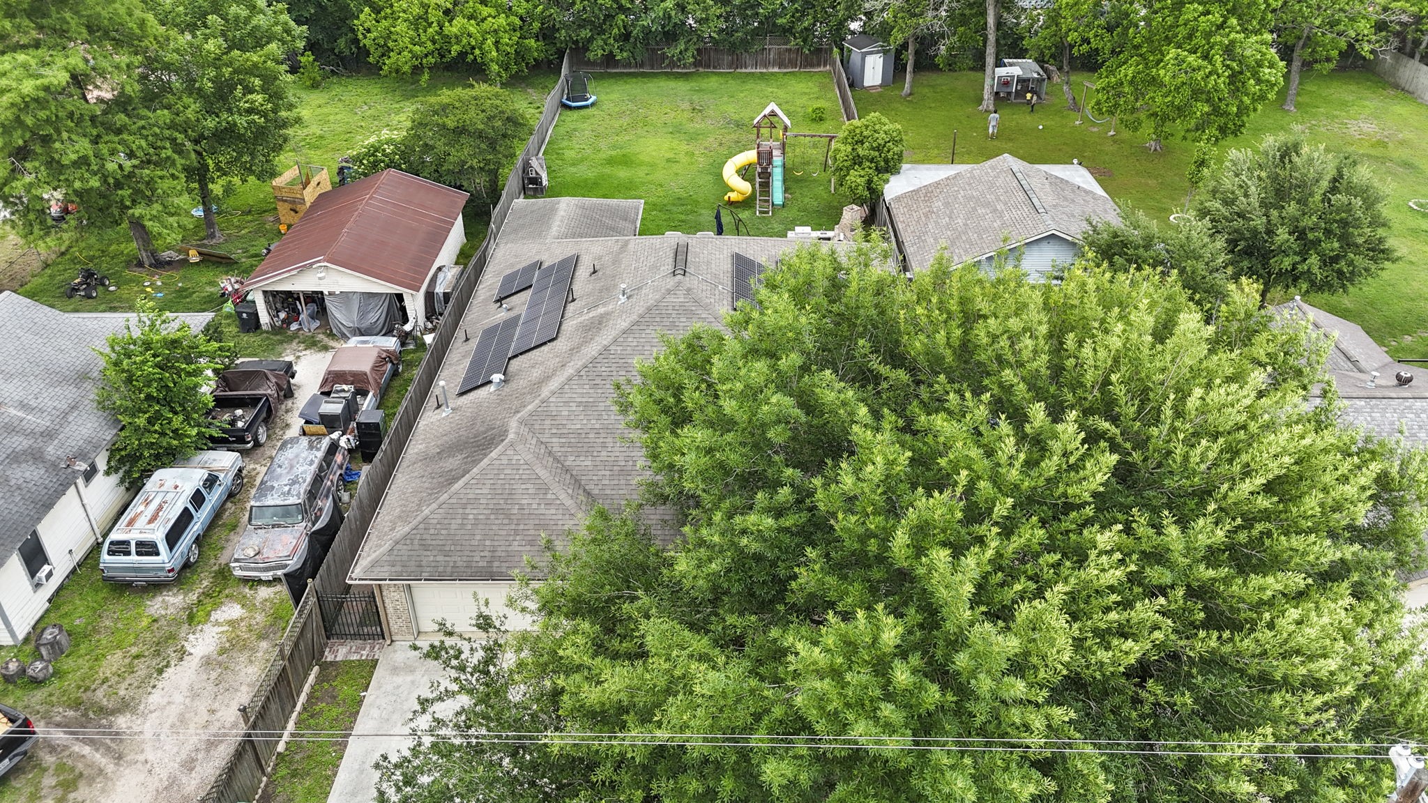 631 Apache Street Houston, TX 77022 - Photo 8 of 45 an aerial view of a house with outdoor space and a garden