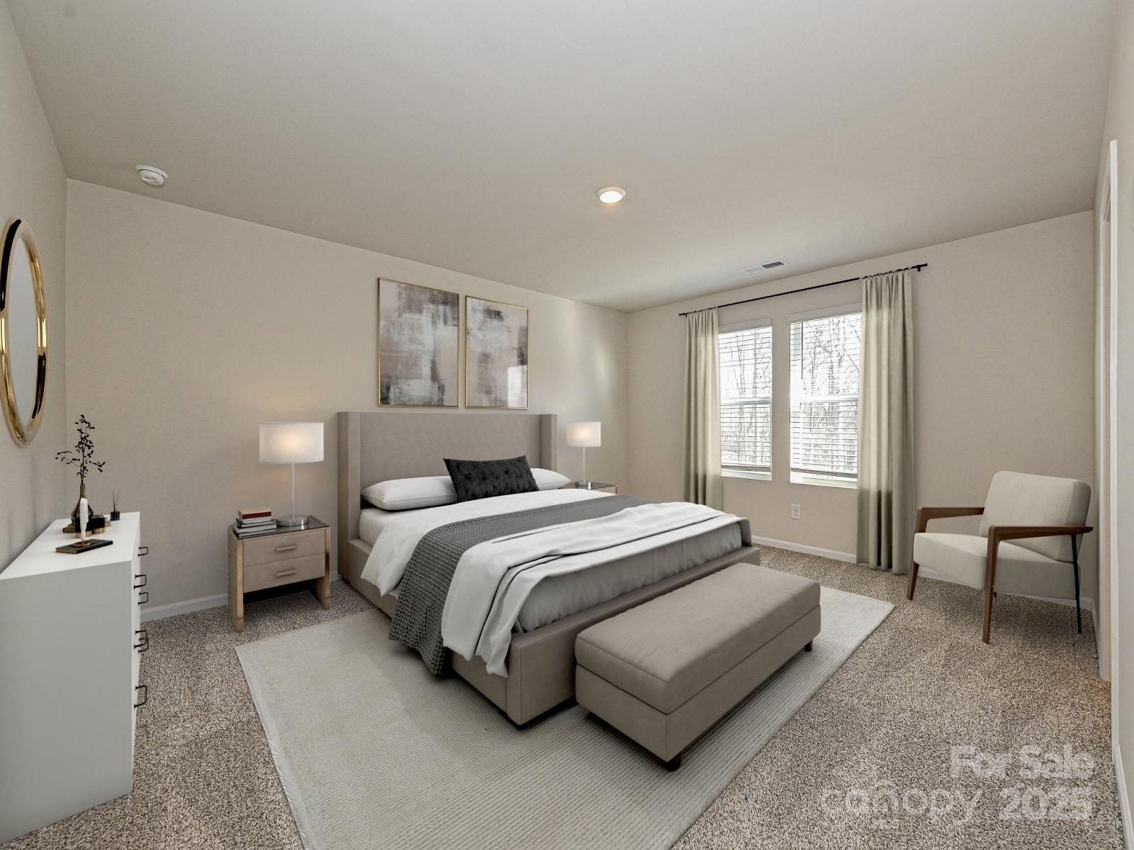 202 Nelson Crk Road Mocksville, NC 27028 - Photo 5 of 11 a spacious bedroom with a bed and a couch
