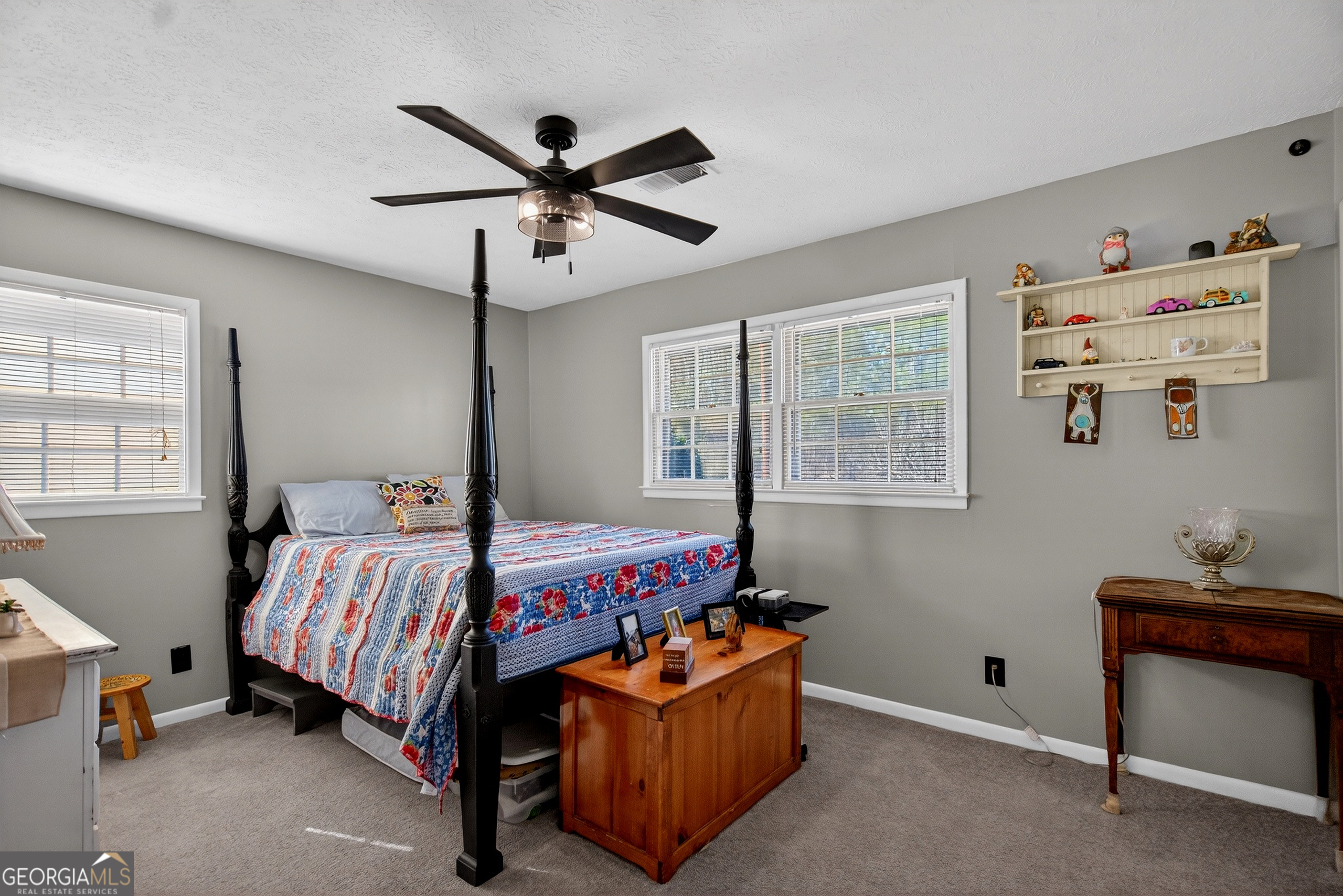 2404 19th Avenue Valley, AL 36854 - Photo 16 of 24 a bedroom with a bed and a window