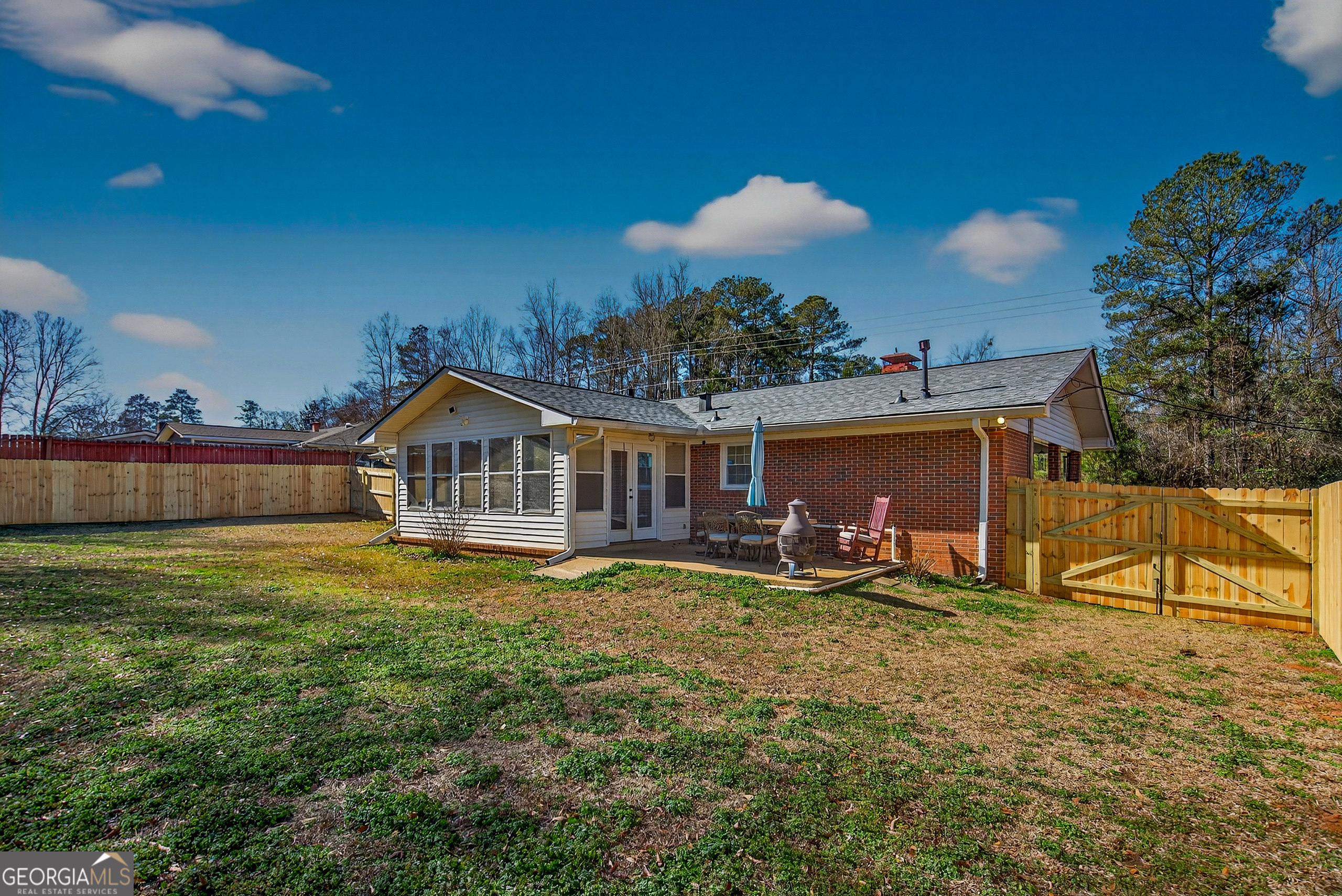 2404 19th Avenue Valley, AL 36854 - Photo 22 of 24 a front view of a house with garden
