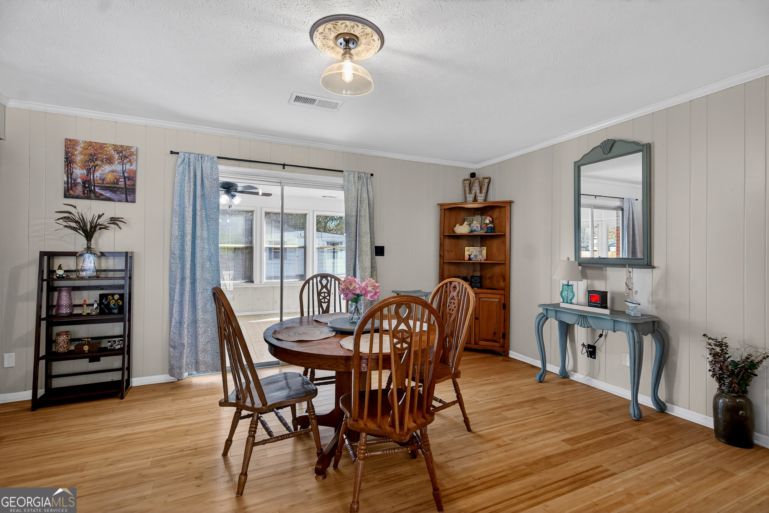 2404 19th Avenue Valley, AL 36854 - Photo 6 of 24 a view of a dining room with furniture and wooden floor