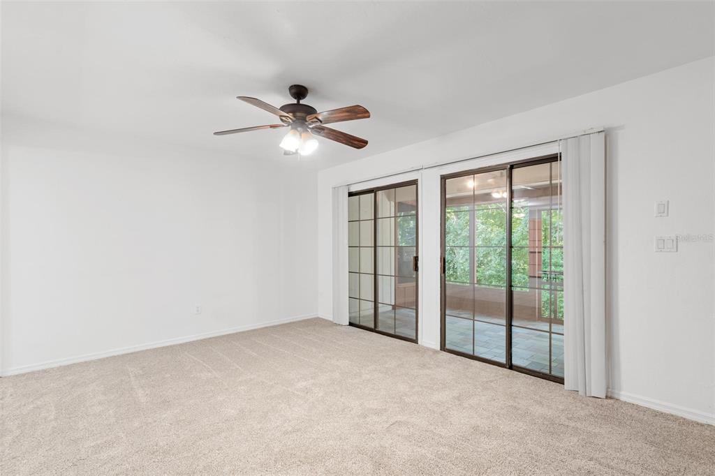 5606 Southwest 8th Place Gainesville, FL 32607 - Photo 16 of 24 a view of an empty room with a window