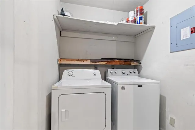 a utility room with dryer and washer